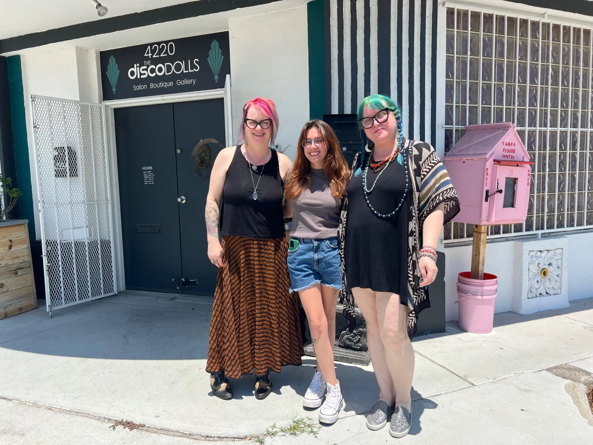Tampa Period Pantry founder Bree Wallace (center) worked with co-owners of the Disco Dolls Studio in Tampa, Leigh Anne Balzekas (right) and Kristine Ownley (left) to open the first location outside the business last August. The store also has a donation box inside where customers can drop off products.