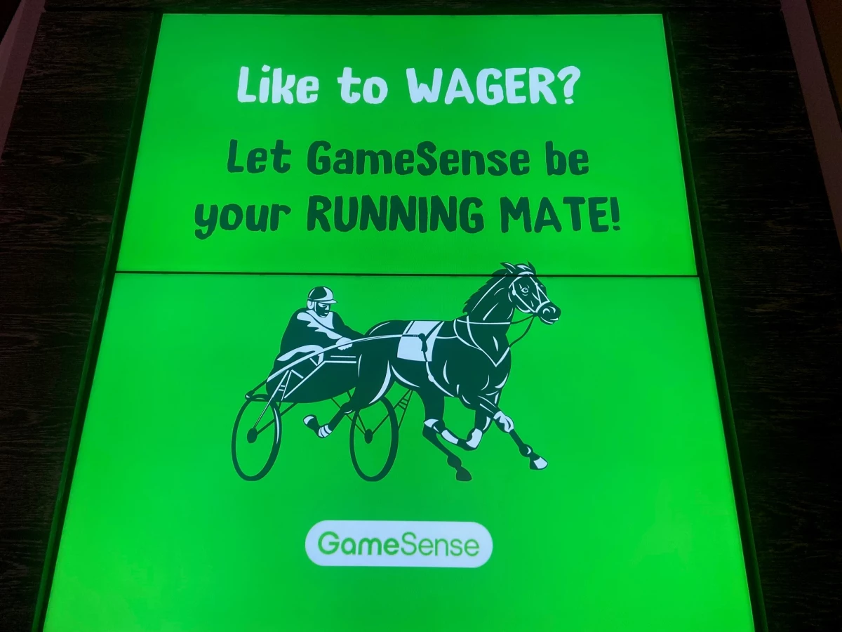 An digital ad for GameSense, a responsible gaming program for Massachusetts residents, appears on a screen at the MGM Springfield casino. 