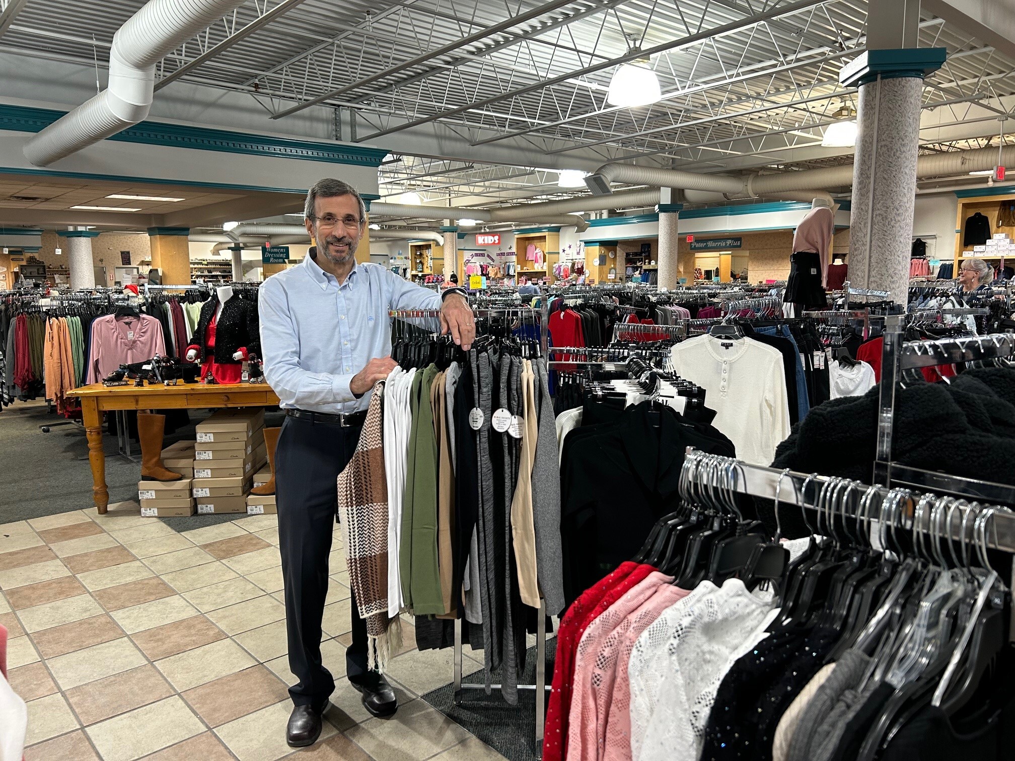 Peter Elitzer, who runs a chain of discount clothing stores called Label Shopper, worries that tariffs will force him to raise prices, turning off already skittish shoppers.