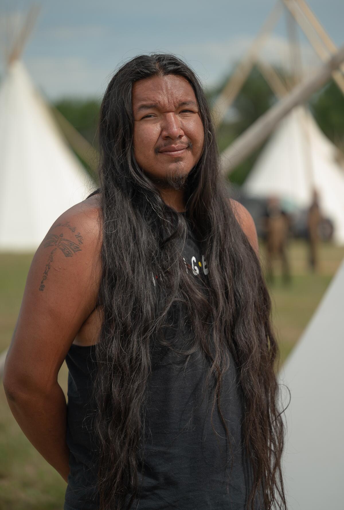 Christopher Eagle Bear, 27, is the youngest tribal council member for the Rosebud Sioux Tribe. He said the commemoration was about reclaiming and celebrating their identity. 