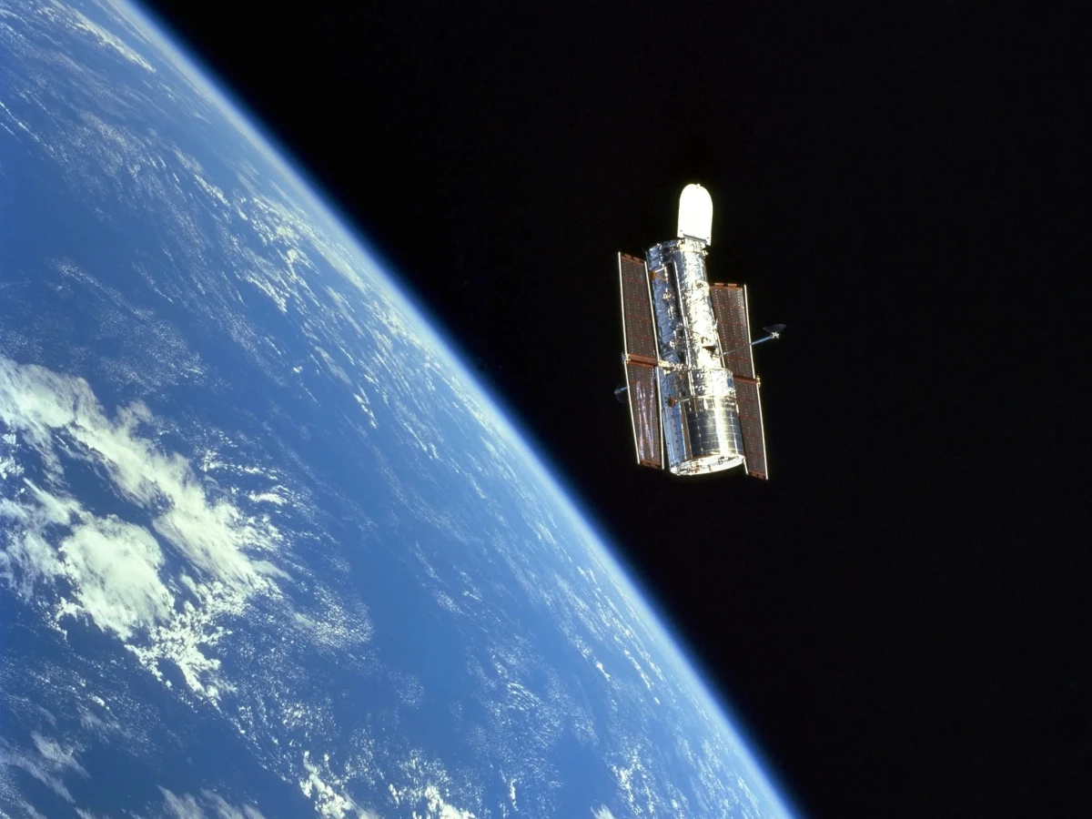 The Hubble Space Telescope in orbit in 1999, just after a servicing mission by astronauts.