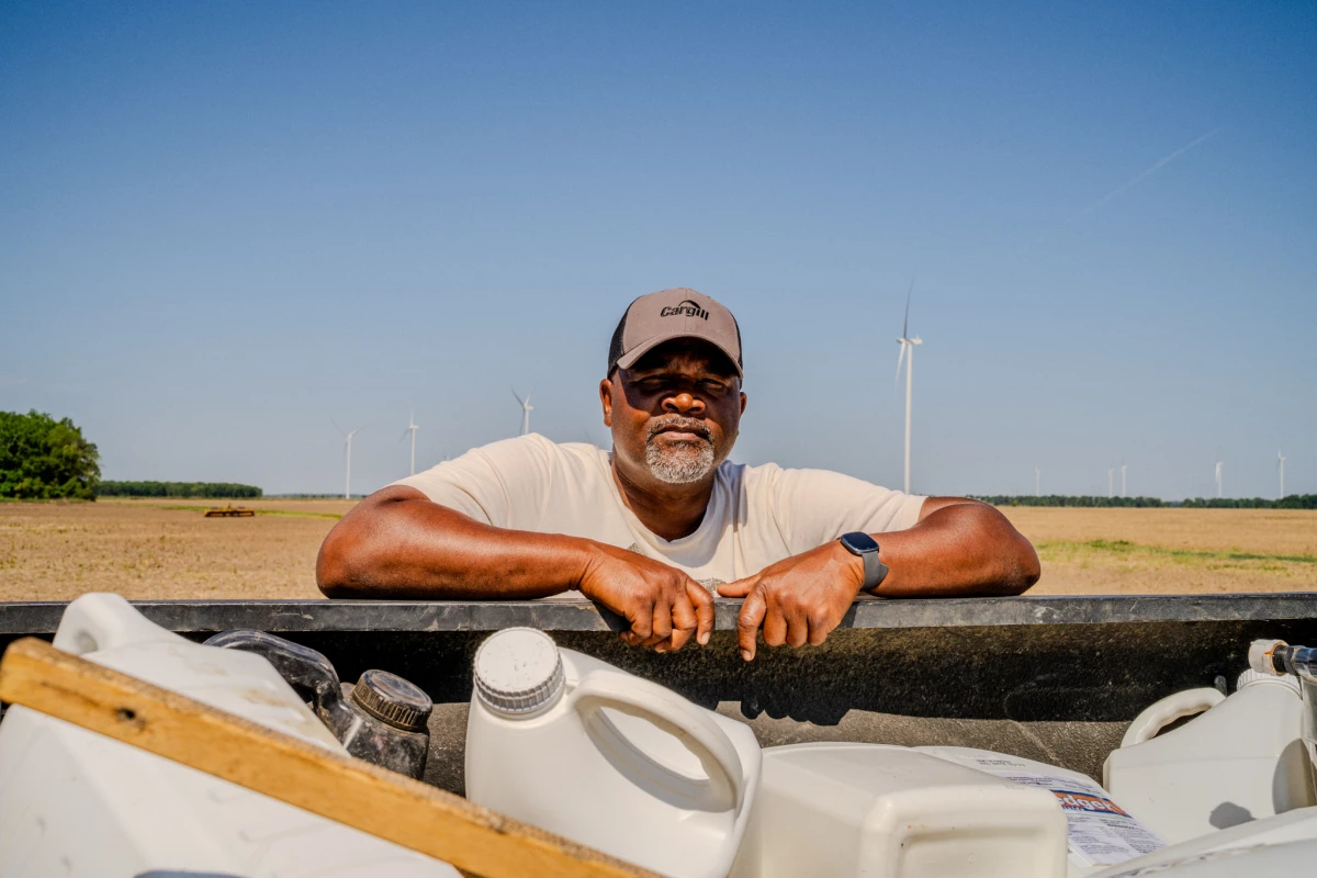 Anthony Bland, 58, leans over his truck in one of his fields in Sledge, Miss. on Friday, April 17, 2026. When asked if he would continue farming, Bland referenced the definition of insanity as 'doing the same thing expecting different results,' adding, 'with tariffs on top of the war, we know the results aren't going to get any better.'