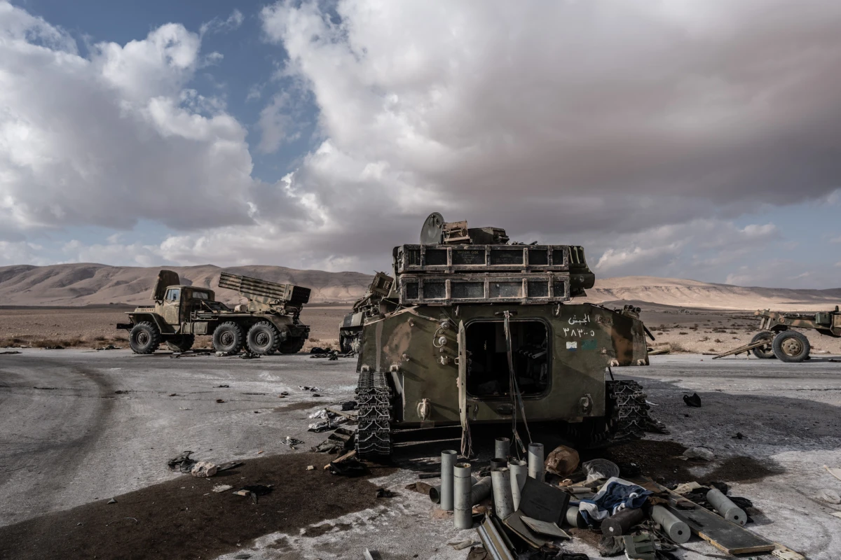 Abandoned Syrian military vehicles on the road to the location where Timmerman was handed over to U.S. forces.