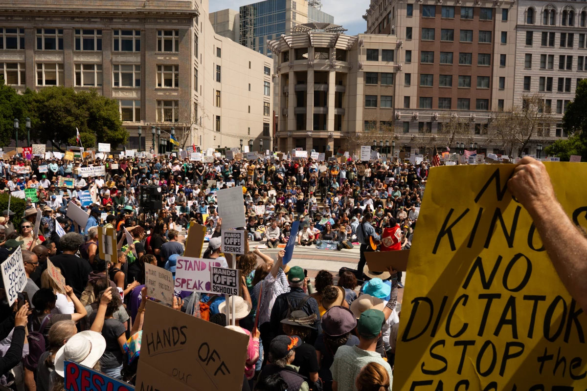 Thousands gather at Frank Ogawa Plaza in Oakland for a protest against Elon Musk and Donald Trump on April 5, 2025.