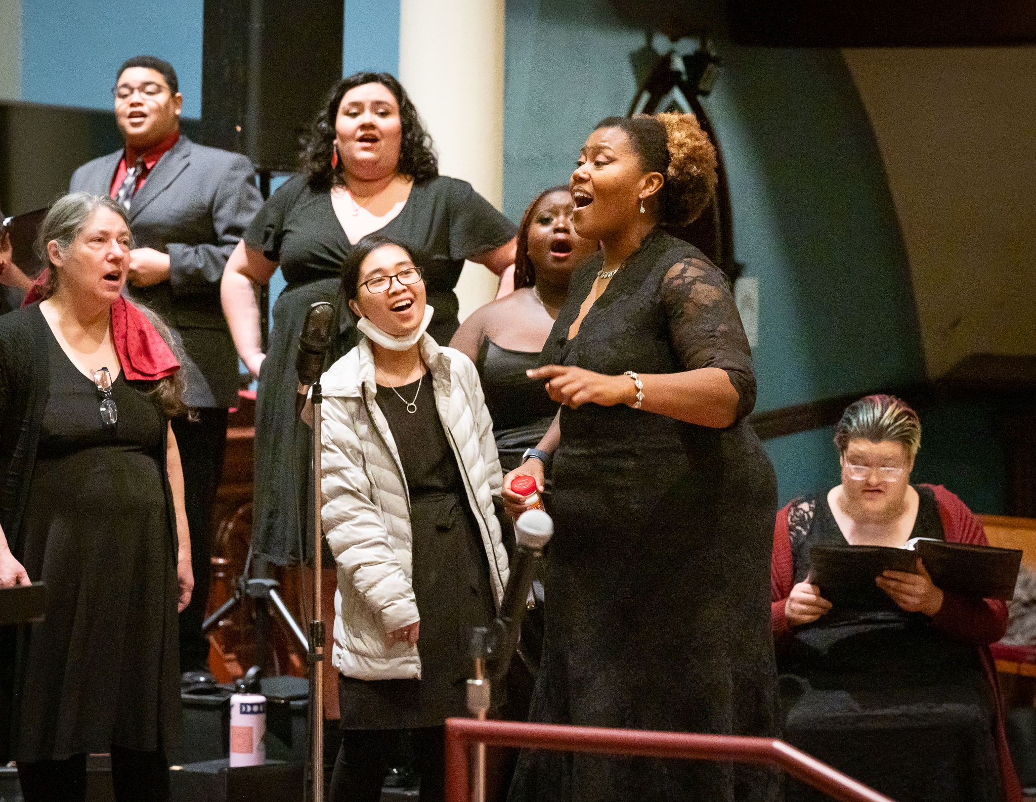 Coty Raven Morris conducts the combined Rose and Thorn Choirs singing an African piece called "Modimo" at the <a href="https://www.pdx.edu/arts/events/from-the-dust1"target="_blank" >From the Dust<!-- raw HTML omitted --> concert performed at First Congregational Church in Portland in November, 2023.