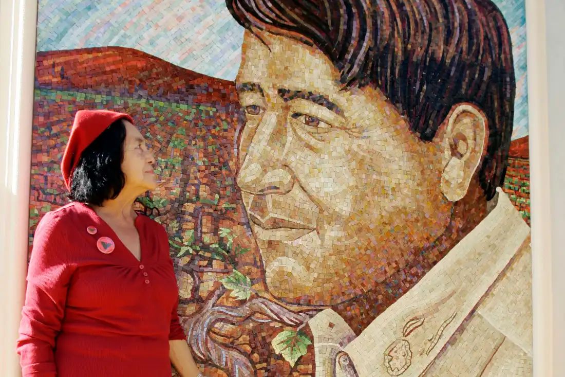 Dolores Huerta looks at a mural of the late Cesar Chavez during a dedication of the Cesar Chavez Monument on the San Jose State University campus in San Jose, Calif., Sept. 4, 2008.