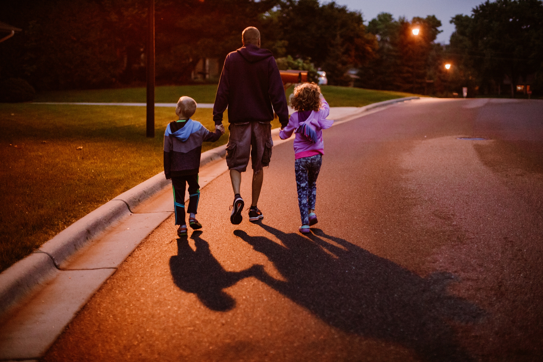 Even a short walk around the block after dinner aids digestion, helps regulate blood sugar and promotes a better night's sleep. (Getty Images)