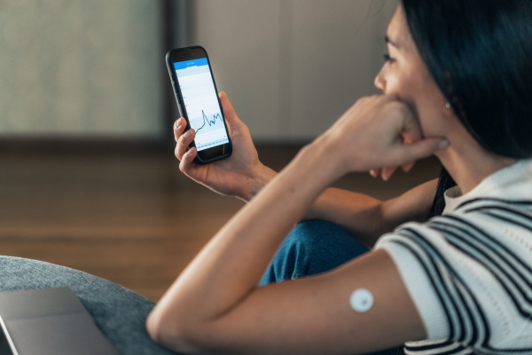 A continuous glucose monitor helps people track their blood sugar spikes and dips.