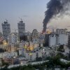 Smoke rises from the rubble of an Iranian state media building in Tehran after an Israeli airstrike on June 16, 2025. The strike, which Israel confirmed targeted "terror-linked propaganda infrastructure," marks a further escalation in regional tensions.