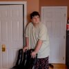 Logan, 17 and a junior at Newton South High School, stands in his room in Newton, Mass. Logan was part of a program called Charting My Path, which helps students with disabilities prepare for life after high school. The Trump administration cancelled the program in February.