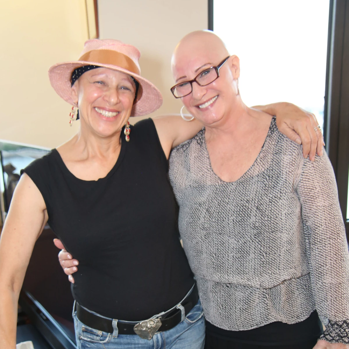 Thea Chassin (right), founder of Bald Girls Do Lunch, with group member Carrie Stern