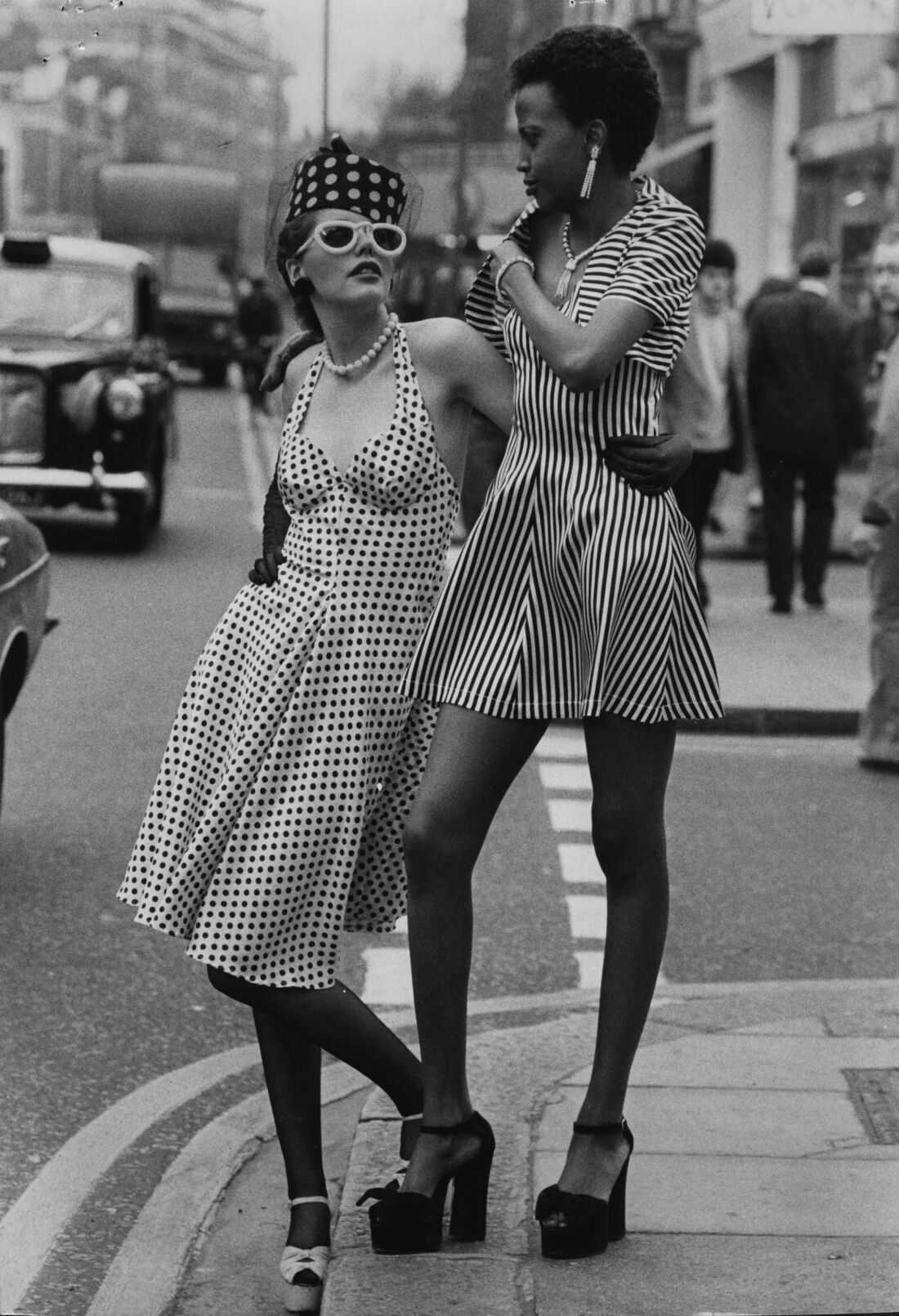Models Endy Cartnell (left) and Selina, on the King's Road, Chelsea, London in 1973.