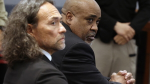 Duane Davis, right, and his attorney Michael Sanft sit in a courtroom after a jury found Davis guilty of first-degree murder in his trial related to the 1996 killing of rapper Tupac Shakur, at Clark County District Court Regional Justice Center, Monday, Aug. 31, 2026, in Las Vegas.