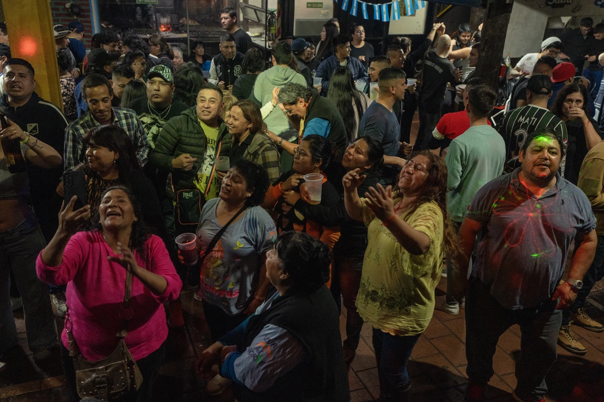People gather at La Peña de Mario Ibarra in the La Boca neighborhood of Buenos Aires to celebrate Pachamama Day on Aug. 1, 2024. Members of the Bolivian, Salta and Jujuy communities take part in the traditional Andean ceremony honoring Mother Earth.