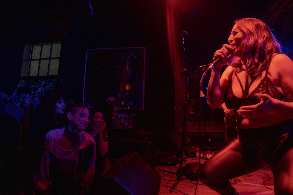 Melissa Lobos, the lead singer for the dissident band Cachitas Now!, performs at Ciudad de Gatos bar in La Plata, Argentina, on July 28, 2024.