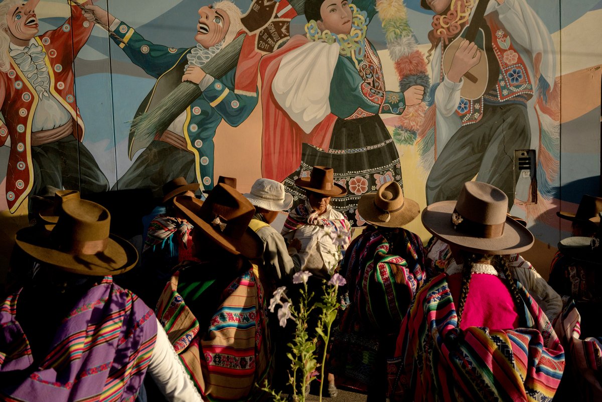 Women gather after a celebration for the 137th anniversary for the city of Sicuani, Peru, on Nov. 4, 2024. Armonía 10, a Peruvian orchestra that plays cumbia and was originally founded in 1972, played in Sicuani that night.