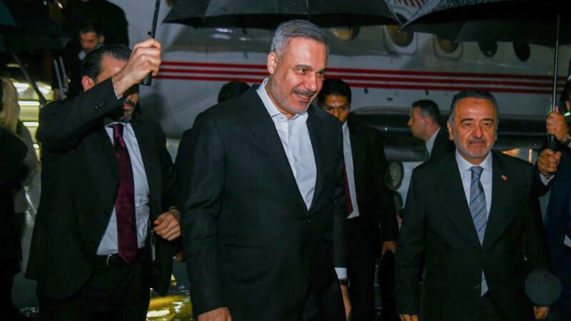 In this photo released by the Pakistan Ministry of Foreign AffairsTurkish Foreign Minister Hakan Fidancenterwalks toward his car upon arrival to attend a meeting in IslamabadPakistanSaturdayMarch 282026.