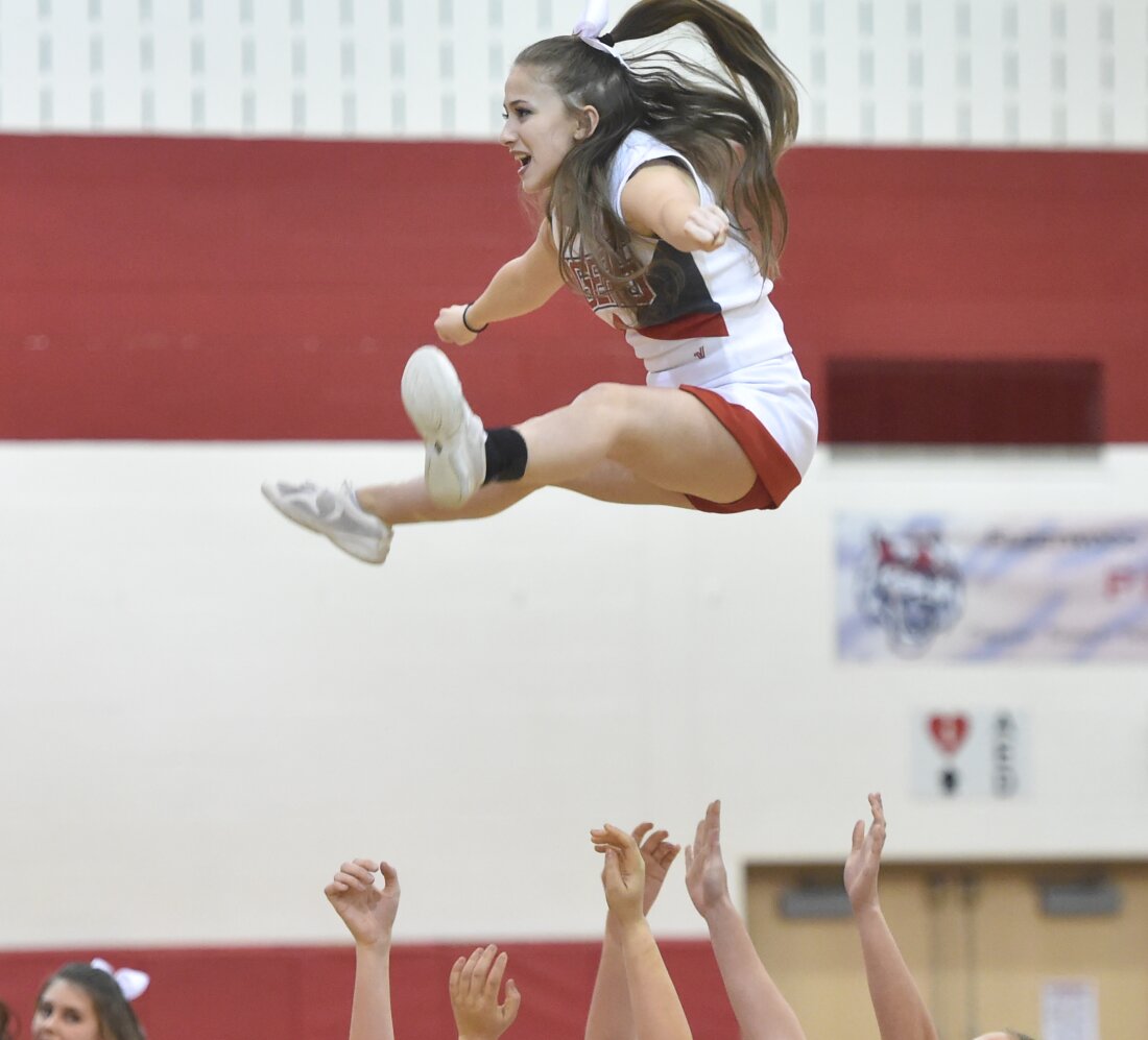 Younger cheerleaders threat accidents as they tackle bold stunts : Photographs Younger cheerleaders threat accidents as they tackle bold stunts : Photographs