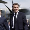 France's President Emmanuel Macron, right, shakes hands with France's Prime Minister Francois Bayrou during the farewell ceremony of Chief of Staff of the French Armed Forces Thierry Burkhard, in the courtyard of the Invalides, in Paris, France, last Friday, Sept. 5, 2025. (AP Photo/Christophe Ena, Pool)