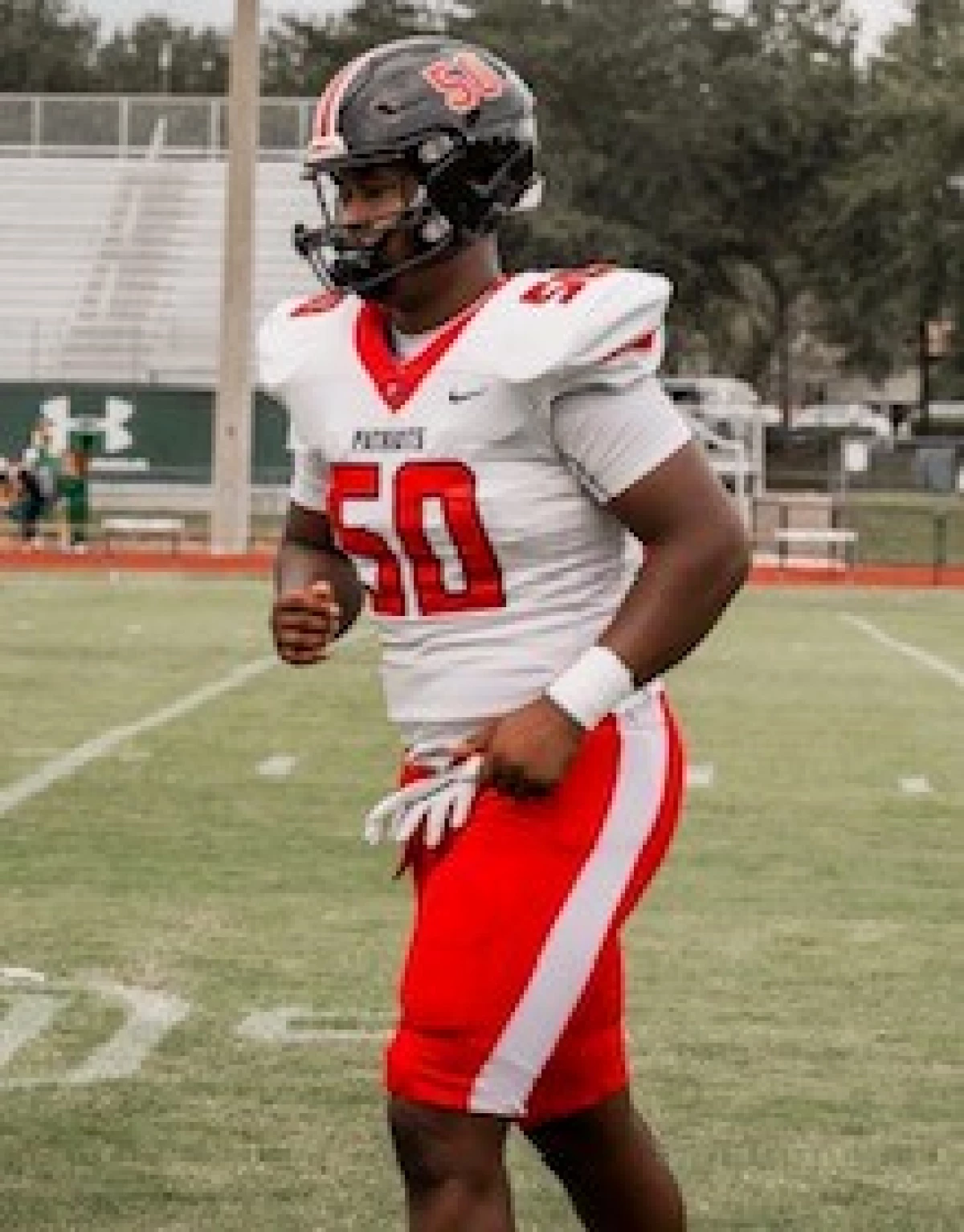 Calvin 'CJ' Dickey Jr. on the football field during his senior year at Carrollwood Day School.