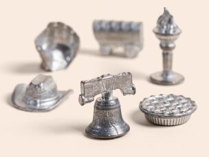 Stateline Industries in Liberty, Indiana fabricated the custom game pieces for the Monopoly Americana edition, with special shapes like a cowboy hat and an apple pie.