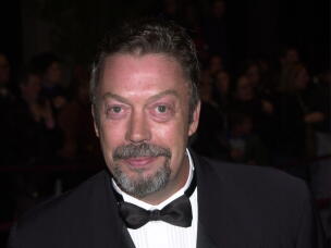 Tim Curry arrives at the Palm Springs International Film Festival gala in January 2001.