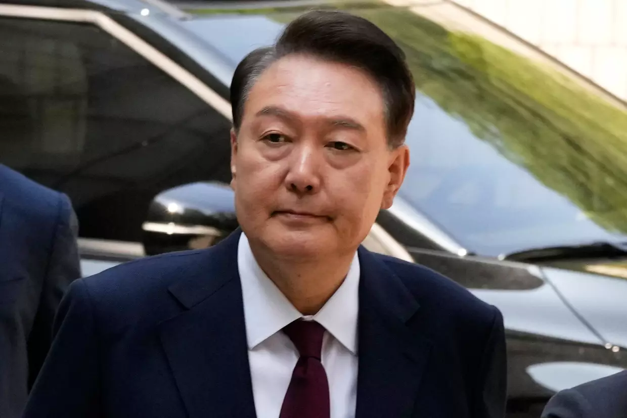 South Korea's ousted former President Yoon Suk Yeol arrives to attend his trial at the Seoul Central District Court in Seoul, South Korea, May 12, 2025.