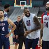 LeBron James, center, between Stephen Curry and Anthony Davis, attend practice before the start of the basketball competition at the 2024 Summer Olympics on Wednesday in Villeneuve-d'Ascq, France.