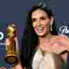 Demi Moore poses in the press room at the 82nd Golden Globe Awards on Sunday night.