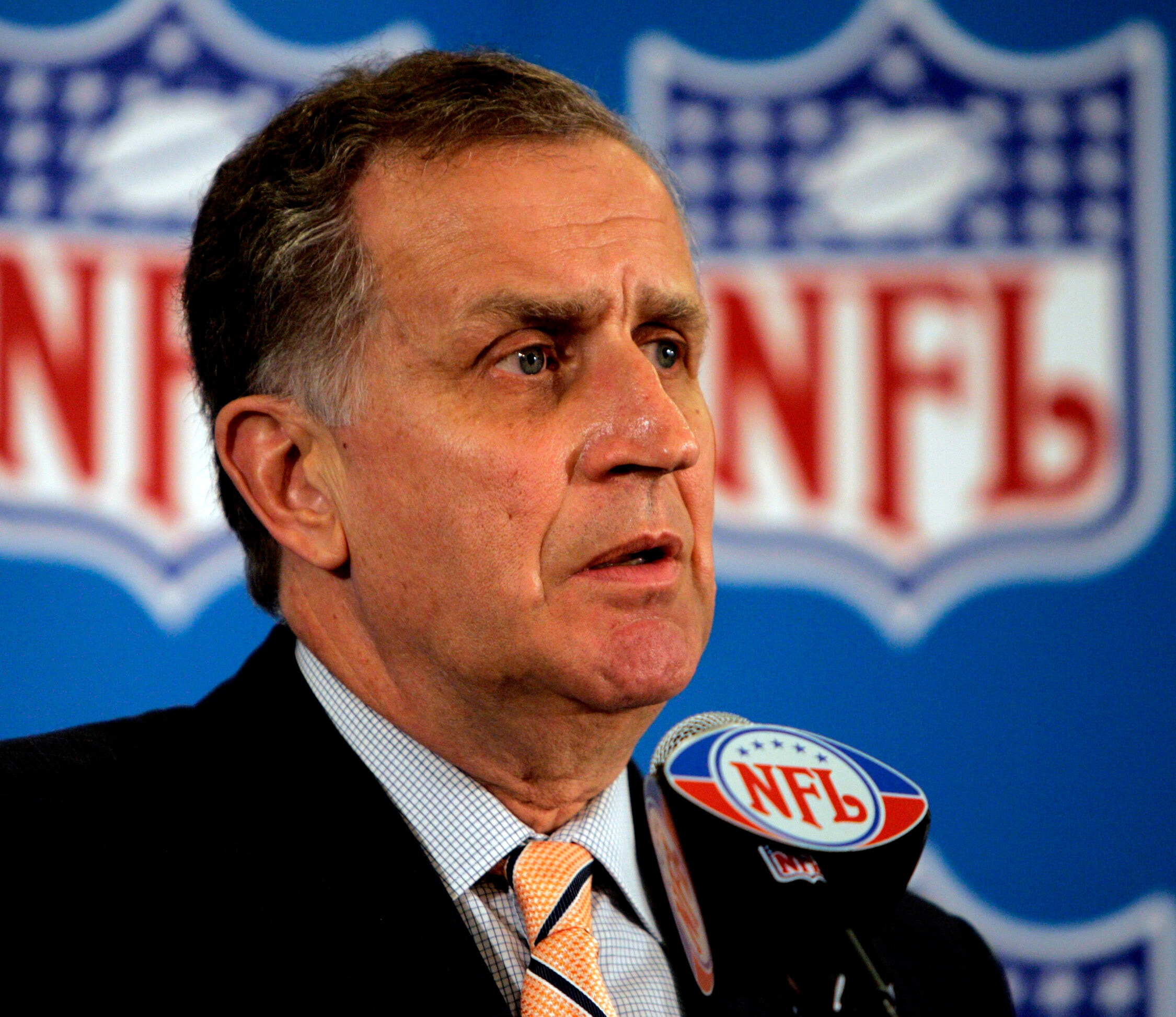 NFL Commissioner Paul Tagliabue responds to questions during a news conference at the conclusion of the National Football League