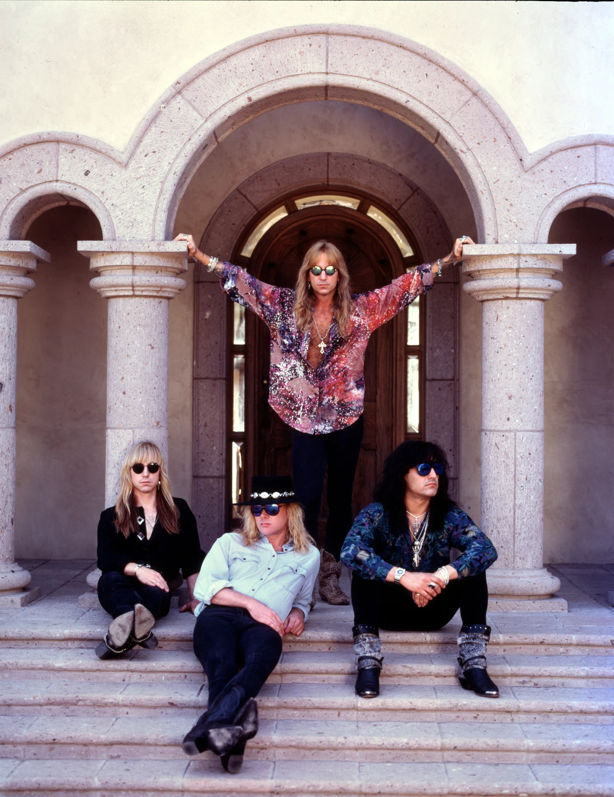 Members of the Los Angeles hard-rock group Great White are shown in this undated photo.  Standing is Jack Russell.  Seated from left to right are, Audie Desbrow, Mark Kendall, and Michael Lardie.