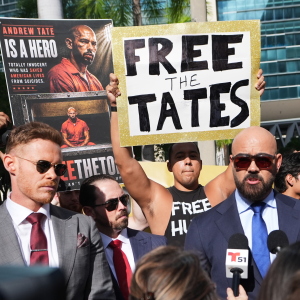 Andrew and Tristan Tate are fighting extradition to the U.K. on charges of rape and human trafficking. Here, their attorney Joe McBride, right, speaks to journalists before an Aug. 27 bond hearing at the C. Clyde Atkins U.S. Courthouse in Miami.