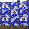 Supporters of the Cameroon People's Democratic Movement (CPDM) hold the new campaign fabric bearing the image of Cameroon's President and presidential candidate Paul Biya.