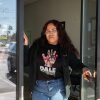 Labor organizer Karin Martinez stands in the doorway at the Arriba Las Vegas Worker Center in Las Vegas, Nev., on January 13, 2025.