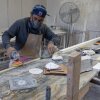 Sun Valley, CA: A stone countertop fabricator wears a mask to help protect against airborne particles which can contribute to silicosis at a shop in Sun Valley, CA. (Brian van der Brug / Los Angeles Times via Getty Images)