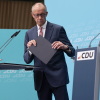 Former German intelligence chief arrested on suspicion of treason: NPR 2 German Chancellor and leader of the Christian Democratic Union (CDU) Friedrich Merz leaves at the end of a press conference a day after state elections in Berlin and Mecklenburg-Western Pomerania, at the CDU headquarters in Berlin, September 21.