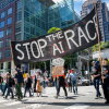 Demonstrators participate in the "Stop the AI Race" protest march in San Francisco, California, on July 11, 2026.