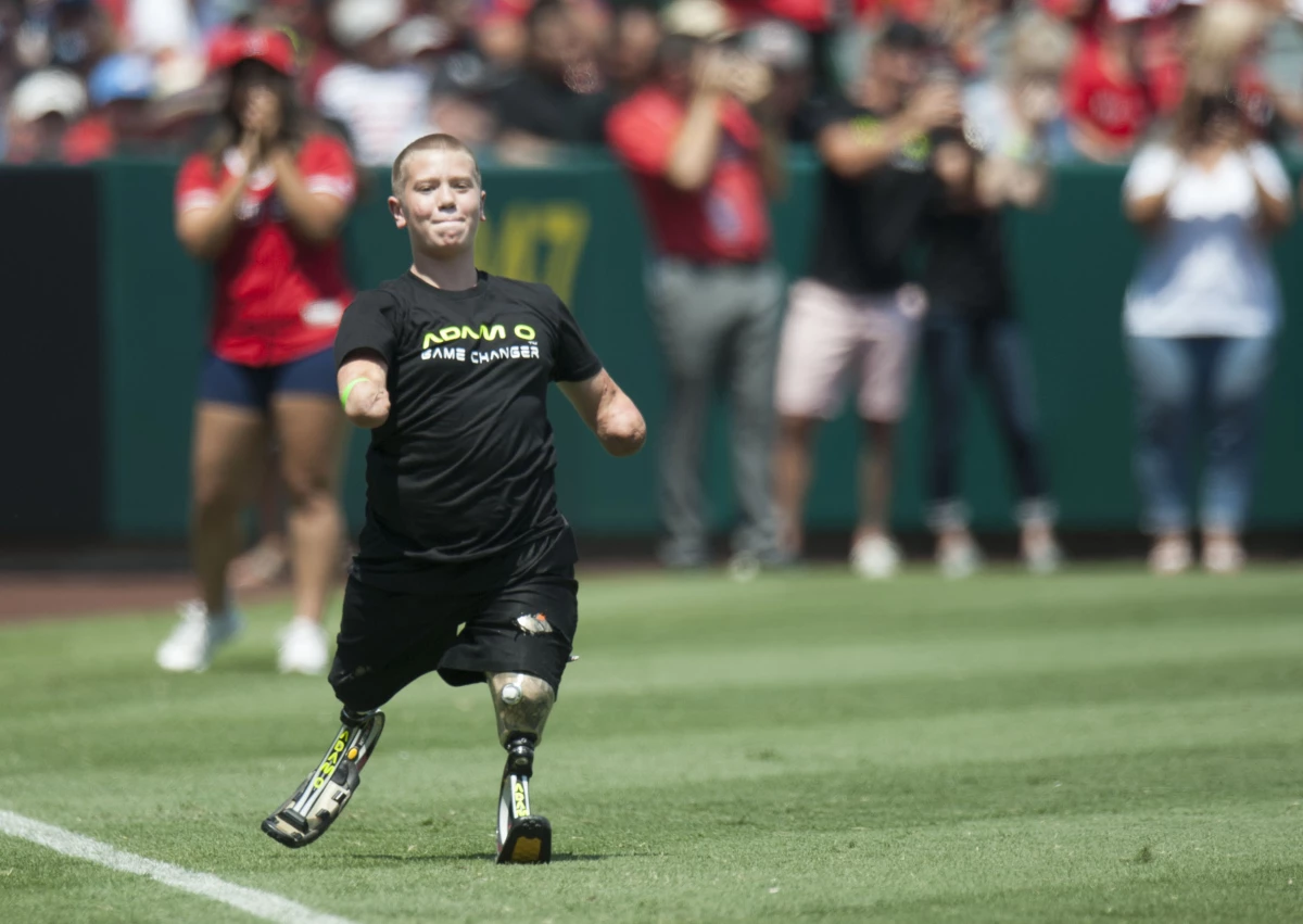 Dayton Webber, then 18, pictured at a baseball game in 2016. In the years before his arrest, he shared his experience playing sports — and turning pro in one of them — as a quadruple amputee.