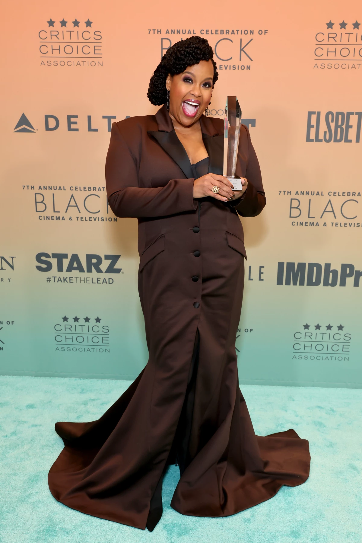 Natasha Rothwell, winner of the producer award, poses at the Winner's Walk during The Critics Choice Association's 7th Annual Celebration of Black Cinema & Television in December 2024 in Los Angeles.