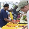 Kate Feurtado, a medical assistant Spectrum Health, browses for produce at a farmers market in Philadelphia, Penn. on July 15, 2026.