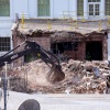An excavator works to clear rubble after the East Wing of the White House was demolished on Oct. 23 in Washington, D.C. The demolition is part of President Trump's plan to build a multimillion-dollar ballroom.