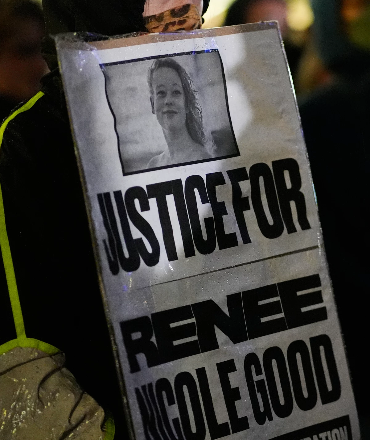 Anna Donigan protests during a rally for Renee Good, who was fatally shot by an ICE officer in Minneapolis the day before, Thursday, Jan. 8, 2026, in Kansas City, Mo.