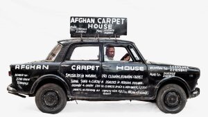 Abdul's vehicle promotes his work as a carpet repair man in Mumbai, India.