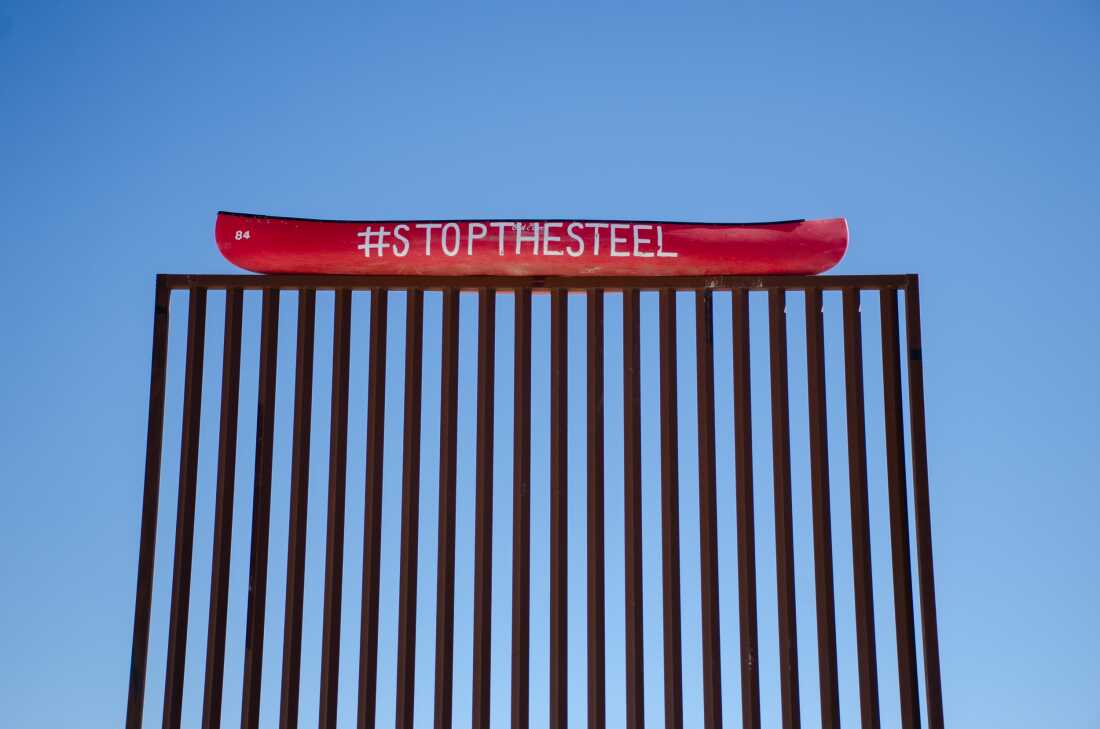 A replica of the 30-foot-tall steel wall stands outside a café in Terlingua, Texas.
