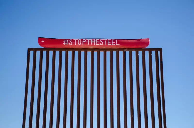 A replica of the 30-foot-tall steel wall stands outside a café in Terlingua, Texas.