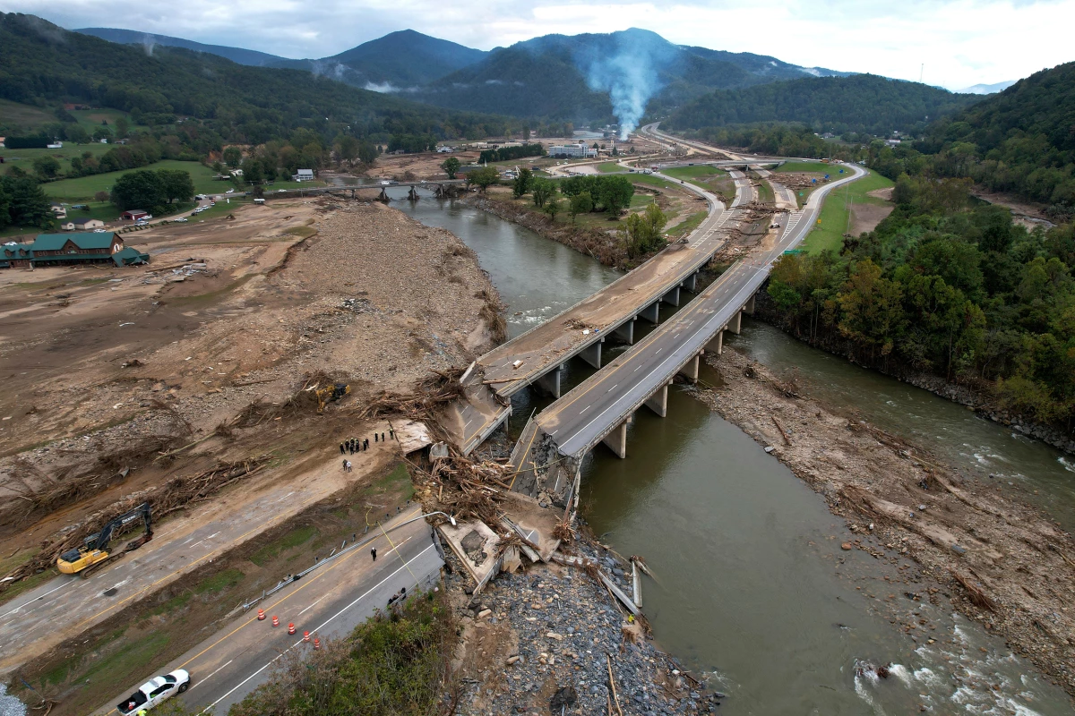 A bridge was destroyed by flooding from Hurricane Helene in 2024 in Erwin, Tenn.