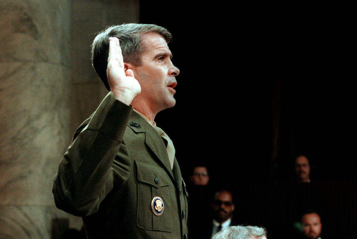 U.S. Army Lt. Col. Oliver North, former aide to National Security Adviser John Poindexter, is sworn in on July 7, 1987, before the House and Senate Foreign Affairs Committee hearing in Washington, D.C., on arms sales to Iran and diversion of profits to Nicaraguan Contra rebels.