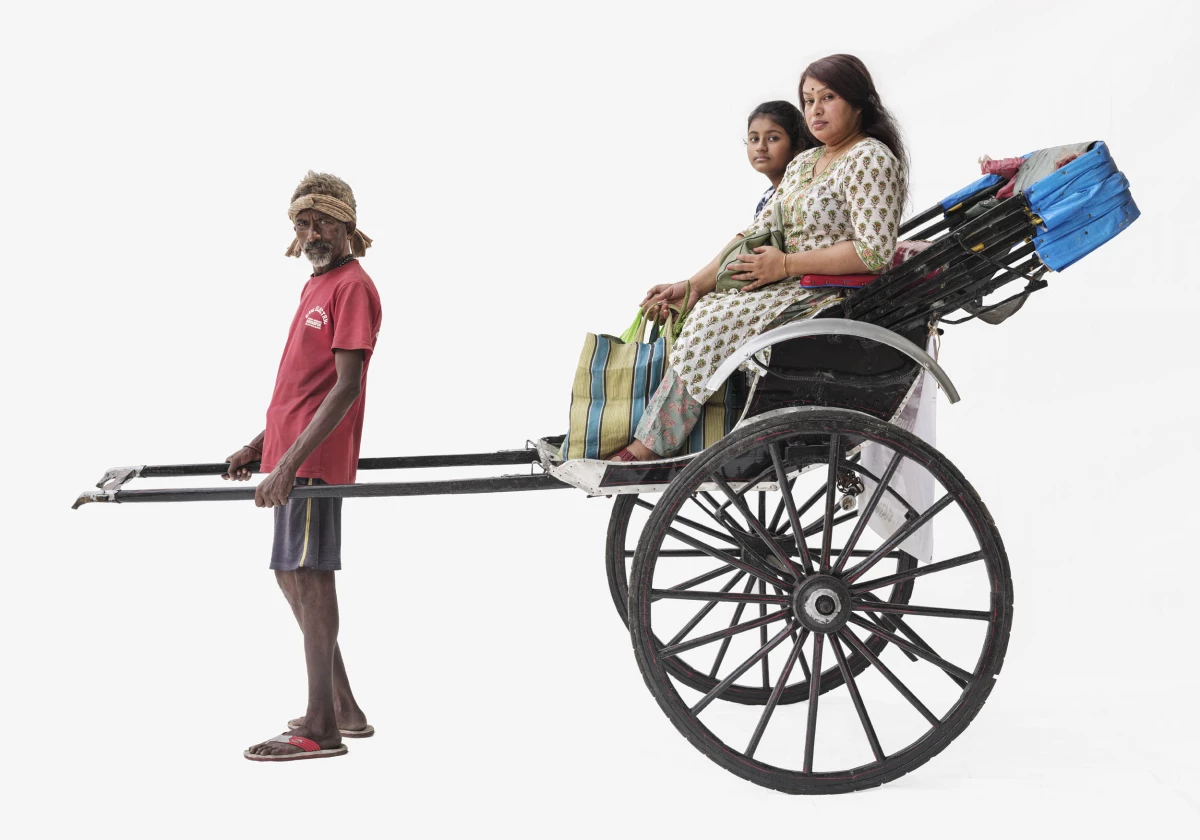 Dinu pulls a rickshaw in Kolkata, India