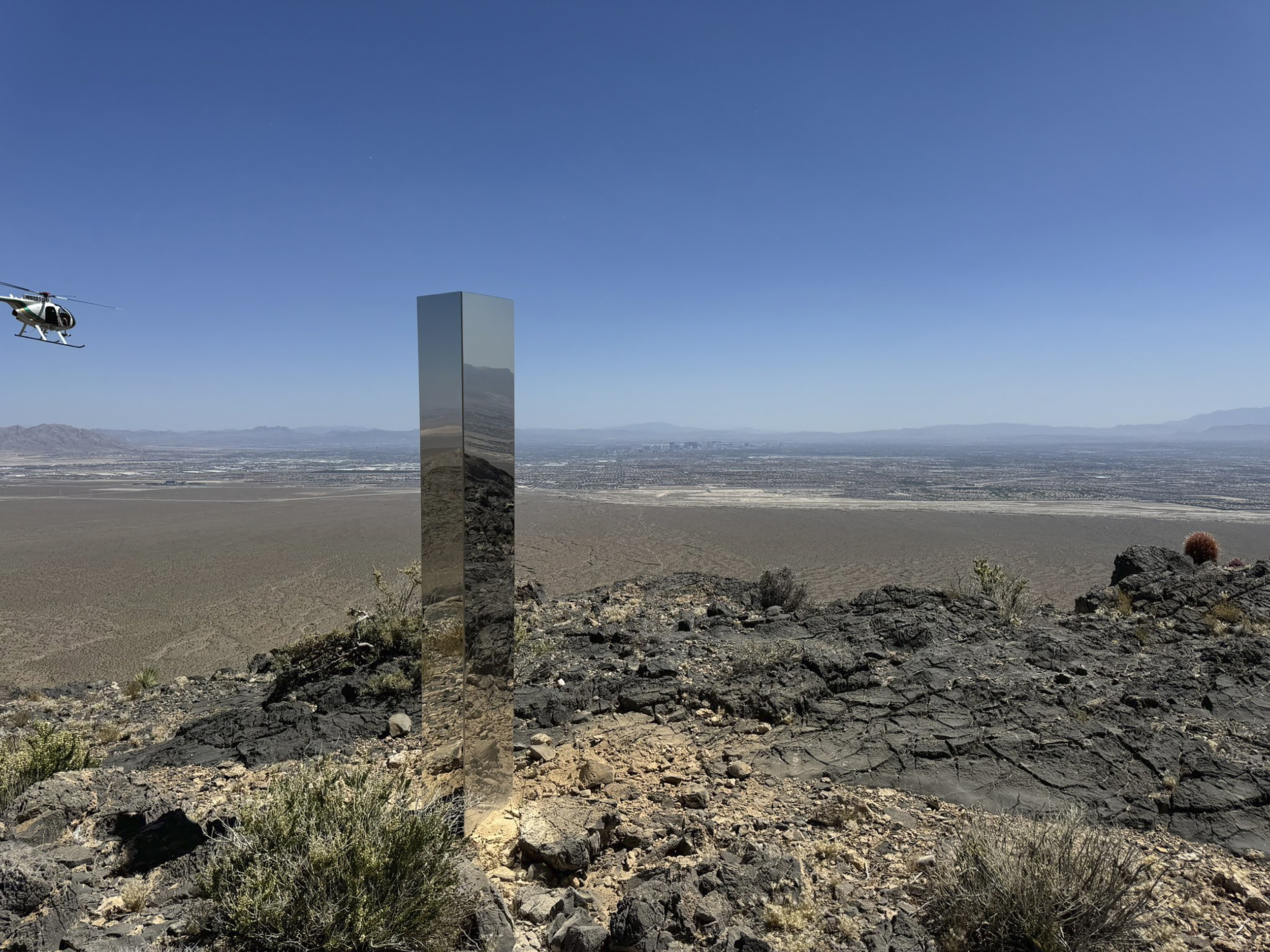 This photo provided by the Las Vegas Metropolitan Police Department shows the monolith found in Gass Peak in Nevada