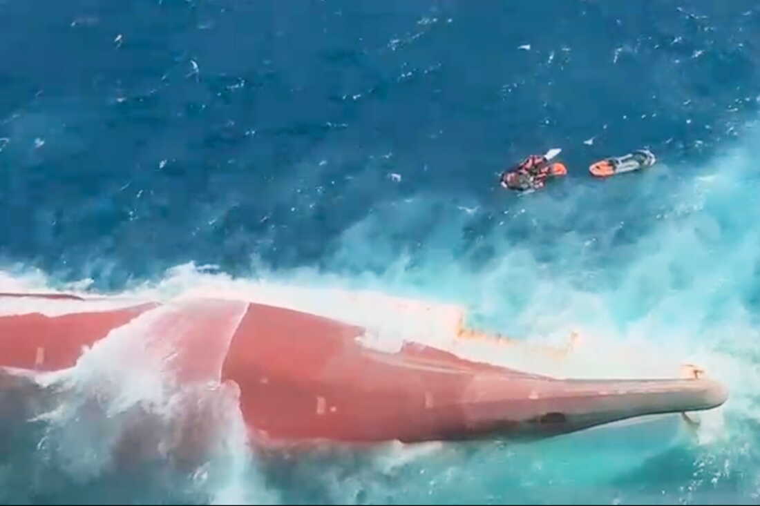 In this aerial image taken from video released by Indonesia's National Search and Rescue Agency (BASARNAS), the bottom of passenger ferry Virgo Transport 8 is seen above the water after it overturned in bad weather in the Java Sea, Sunday, Sept. 13, 2026.